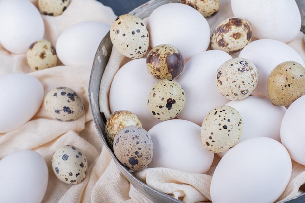 Organic eggs on a piece of kitchen towel.