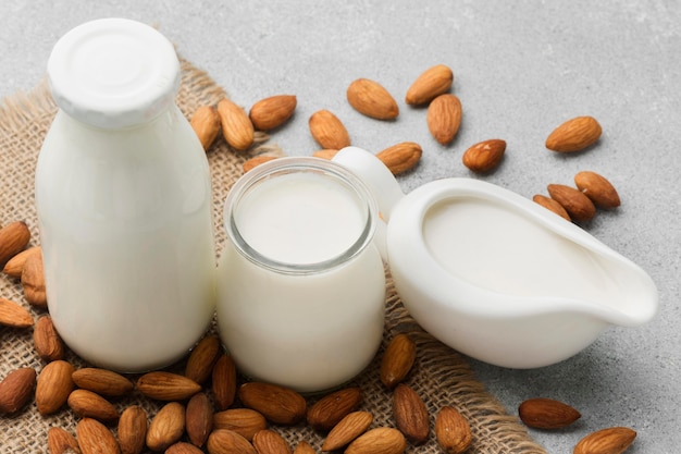 Organic milk with delicious almonds on the table