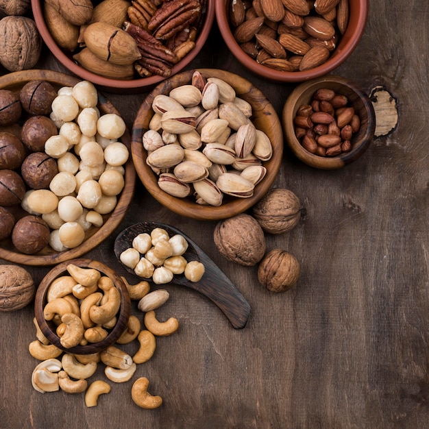 Free Photo organic nuts snack in bowls