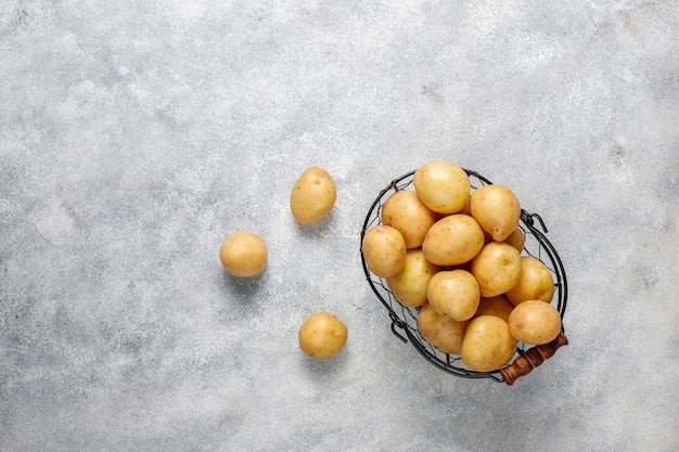 Free photo organic white baby potatoes,top view