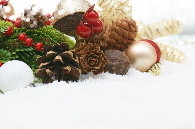 Ornamental christmas elements nestled in snow