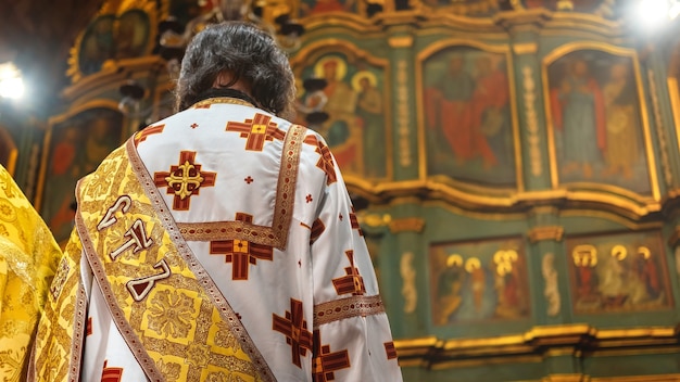 Free Photo orthodox priest serving in a church. wedding ceremony