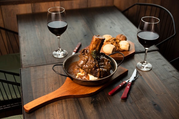 Free Photo osso buco with red wine