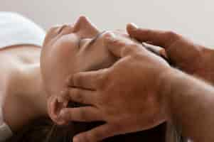 Free photo osteopathy patient getting treatment massage