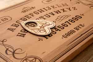 Free photo ouija board and tool high angle