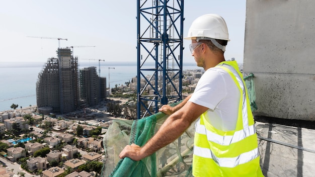 Outdoor construction worker looking away