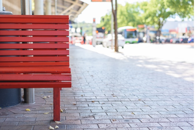 Free photo outdoor red wooden benches