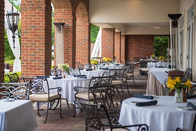 Outdoor restaurant with tables set for a wedding celebration in Marietta Georgia the US