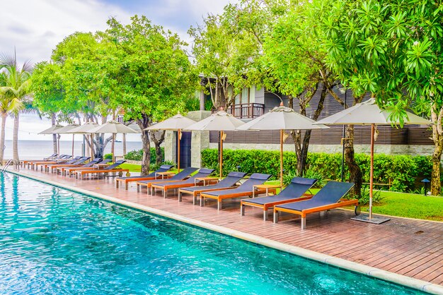 Outdoor Swimming pool in hotel resort for summer vacation