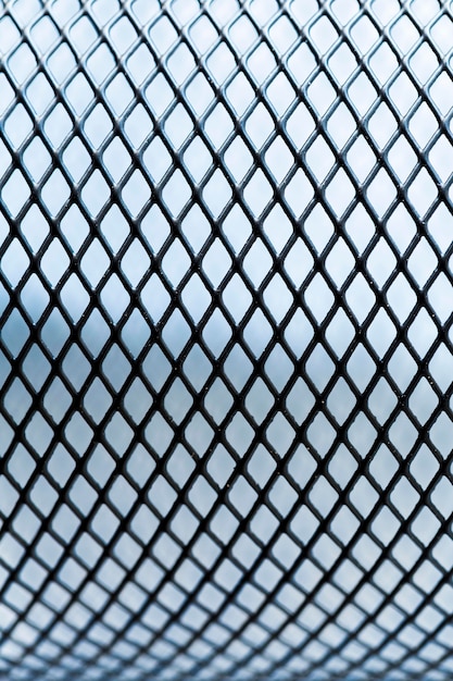 Free photo outdoors metallic fence background