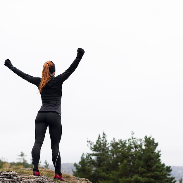 Outdoors running workout and stretching