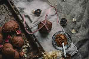 Free photo overhead shot of chocolate cookies on an oven tray