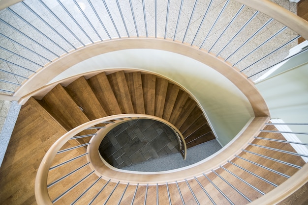 Overhead shot of a modern house wooden spiral staircase