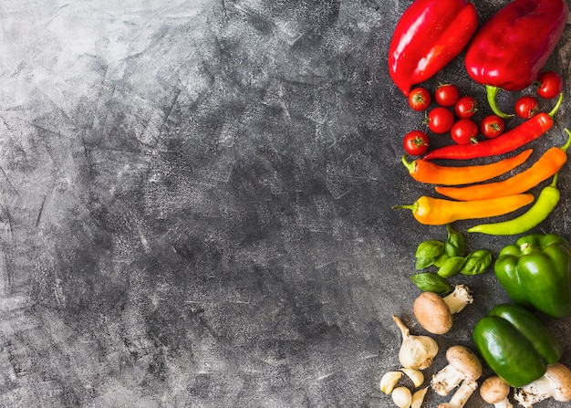 An overhead view of colorful vegetables on grunge background