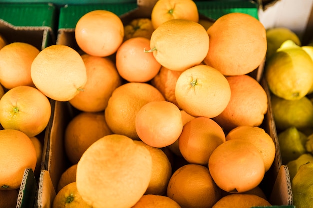 Free photo overhead view of juicy orange at grocery store market