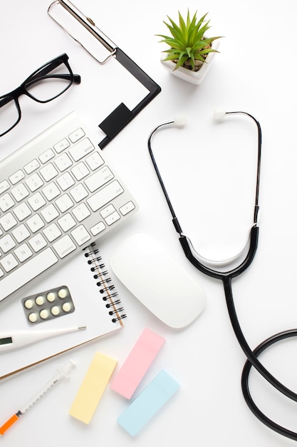 Free Photo overhead view of medical accessories on white surface