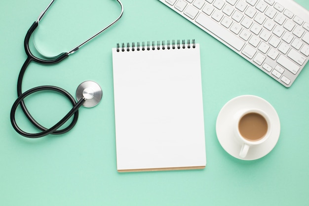 Free photo overhead view of medical desk with wireless keyboard