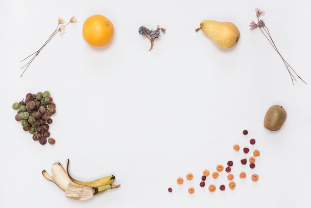 Free photo an overhead view of ripe fruits isolated on white background