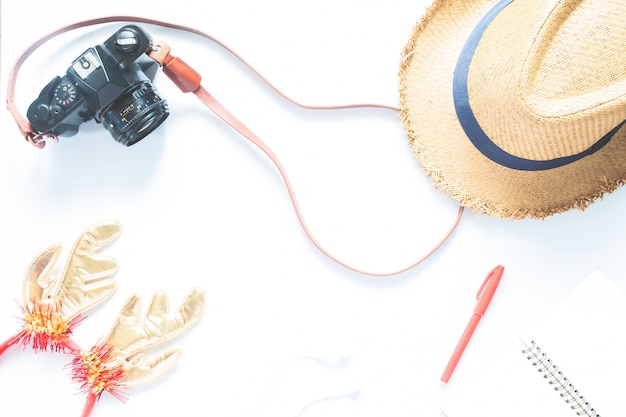 Overhead view of Traveler's accessories, Essential vacation items, Travel concept on white background