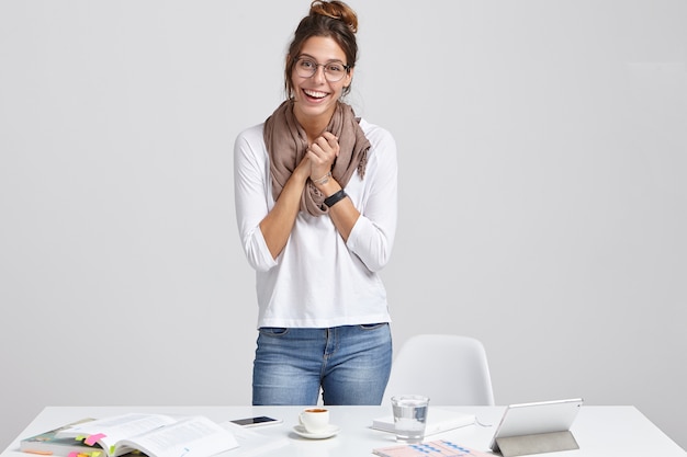 Overjoyed successful lady student makes research alone