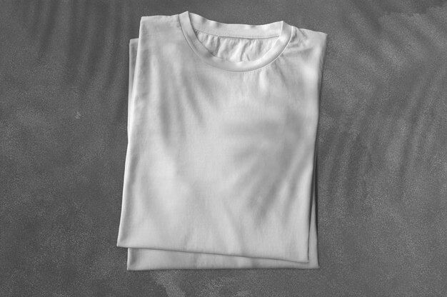 Free Photo pack of folded tshirt with shadows