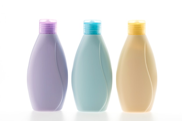 Free Photo pack of three shampoo bottles