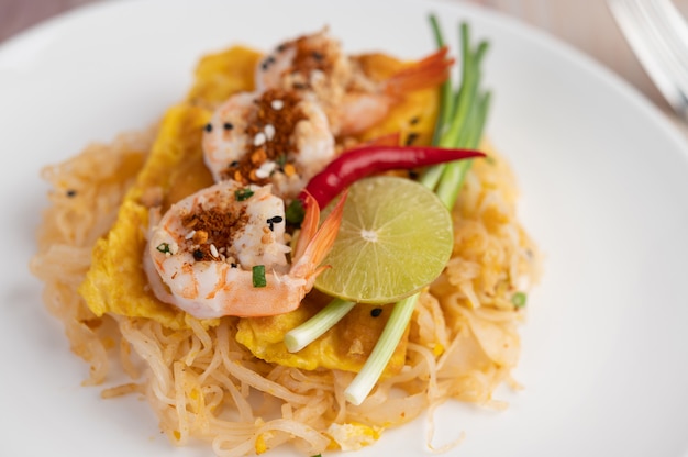 Pad Thai fresh shrimp in a white plate.