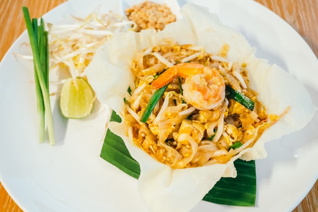 Pad thai noodles with shrimp or prawn on top