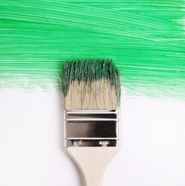 Paint brush with green paint