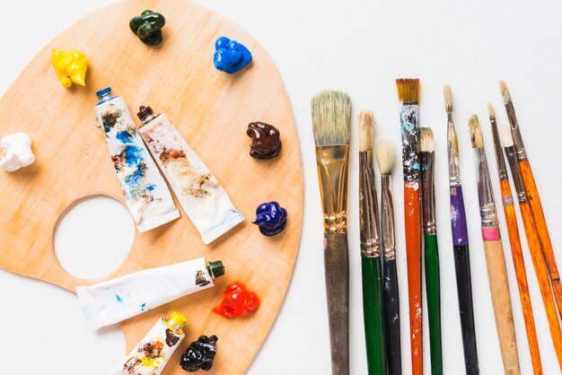 Paintbrushes lying near palette