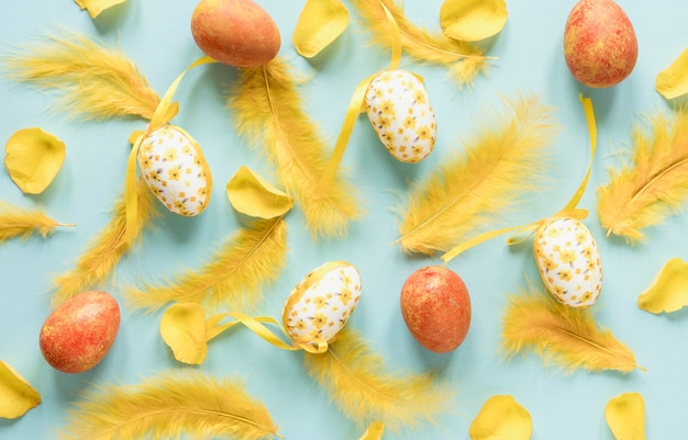 Painted easter eggs and feathers