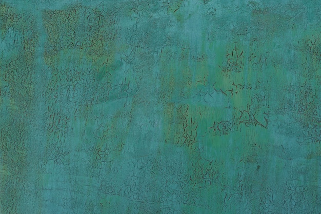 Painted in green old cracked metal rusted background.