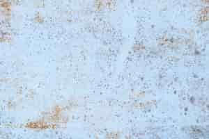 Free photo painted in white old cracked metal rusted background.