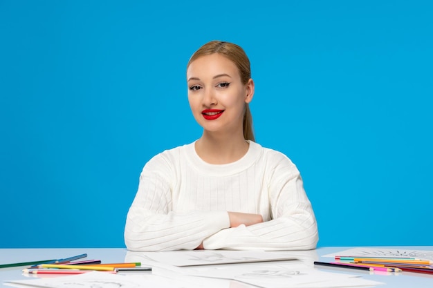 Painter cute young blonde painter girl smiling with colorful pencils on the table