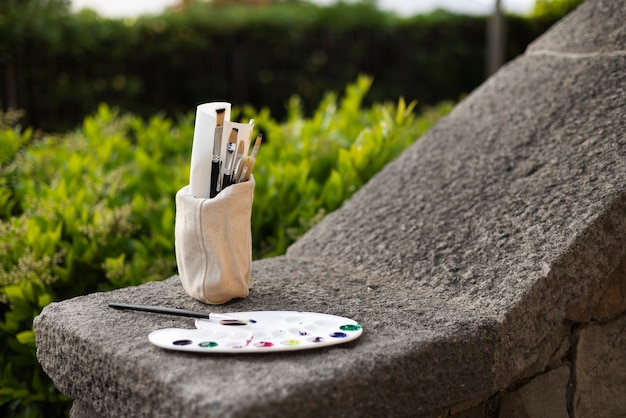 Free Photo painting supplies outdoors still life