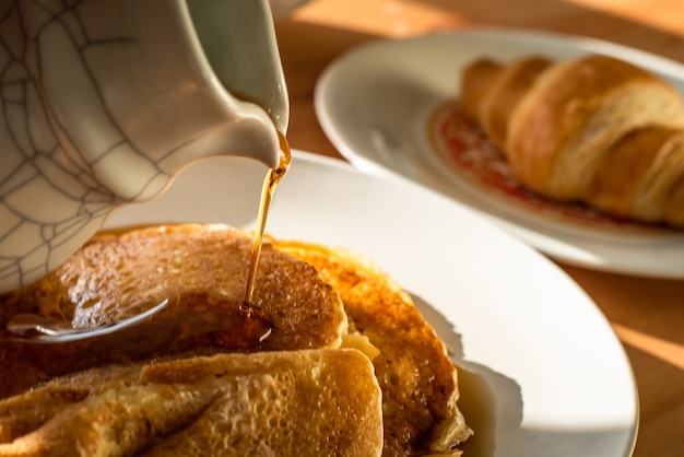 A Pancake and Croissant Breakfast