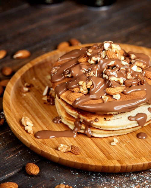 Pancakes with chocolate butter and nuts