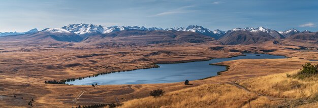 Panorama shot of Lake Alexandria in Lake Tekapo area surrounded with mountains