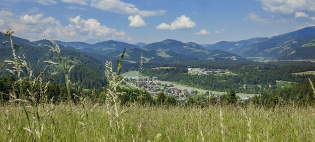 Free Photo panoramic shot of a beautiful landscape at vuzenica valley, carinthia region, slovenia