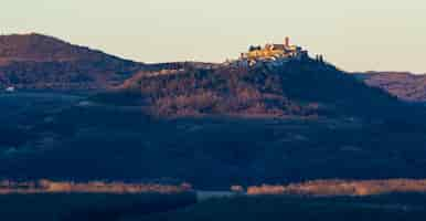 Free photo panoramic shot of the motovun village in istria, croatia in the early morning