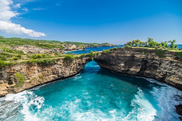 Free Photo panoramic view of broken beach in nusa penida, bali, indonesia. blue sky, turquoise water.