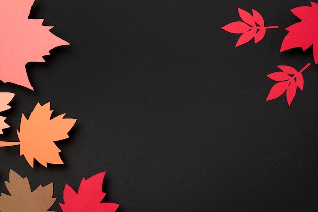 Free Photo paper autumn leaves composition with copy space