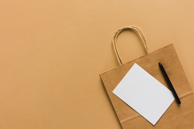 Free photo paper bag with blank paper