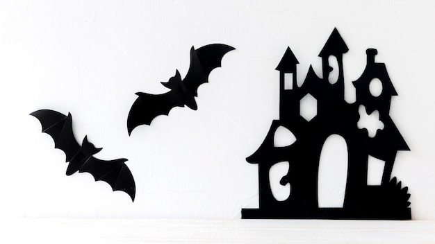 Paper bats hanging near castle