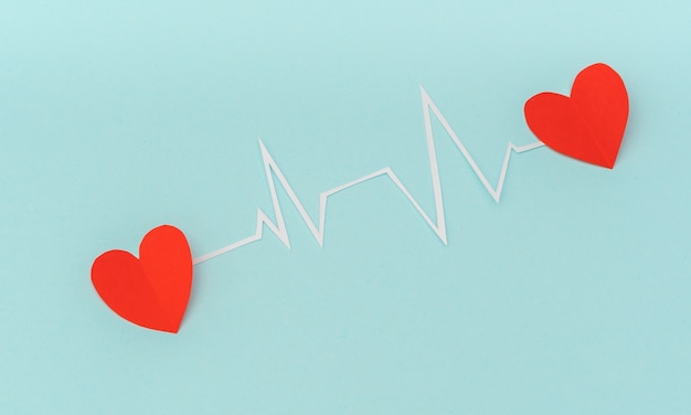 Free photo paper cut of cardiogram of heart rhythm for valentines day .