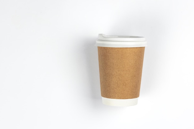 Free Photo paper disposable cup on a white background flat lay