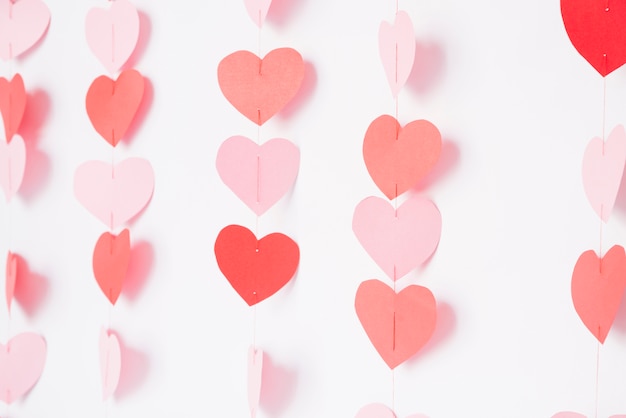 Free Photo paper hearts hanging on rope 