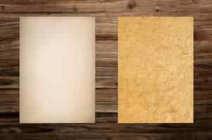 Free photo paper mockup set on wood background