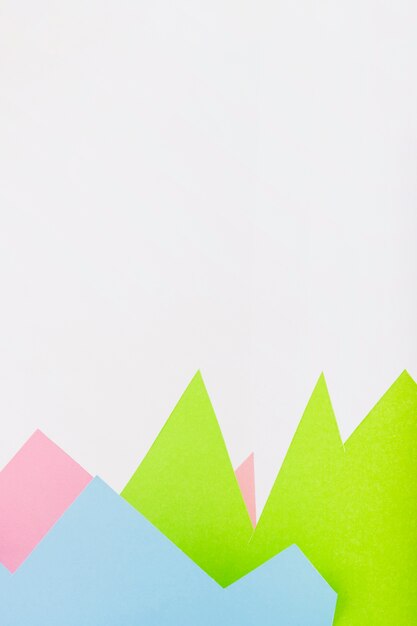 Paper mountains on white background