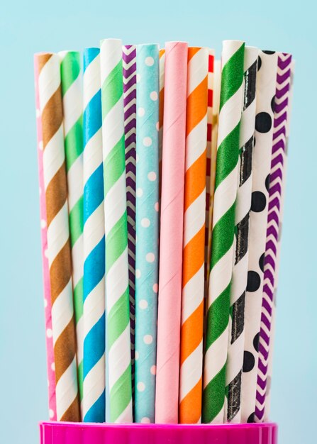 Paper straws in a cup close-up